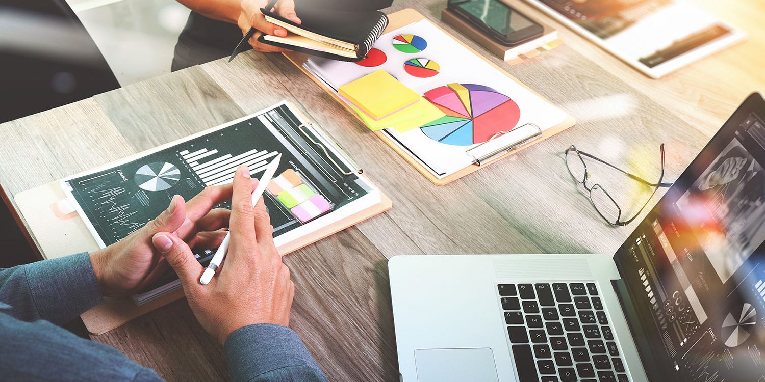 Businessman making presentation with his colleagues and business